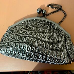 Chrome color bag, nice for dressy or casual